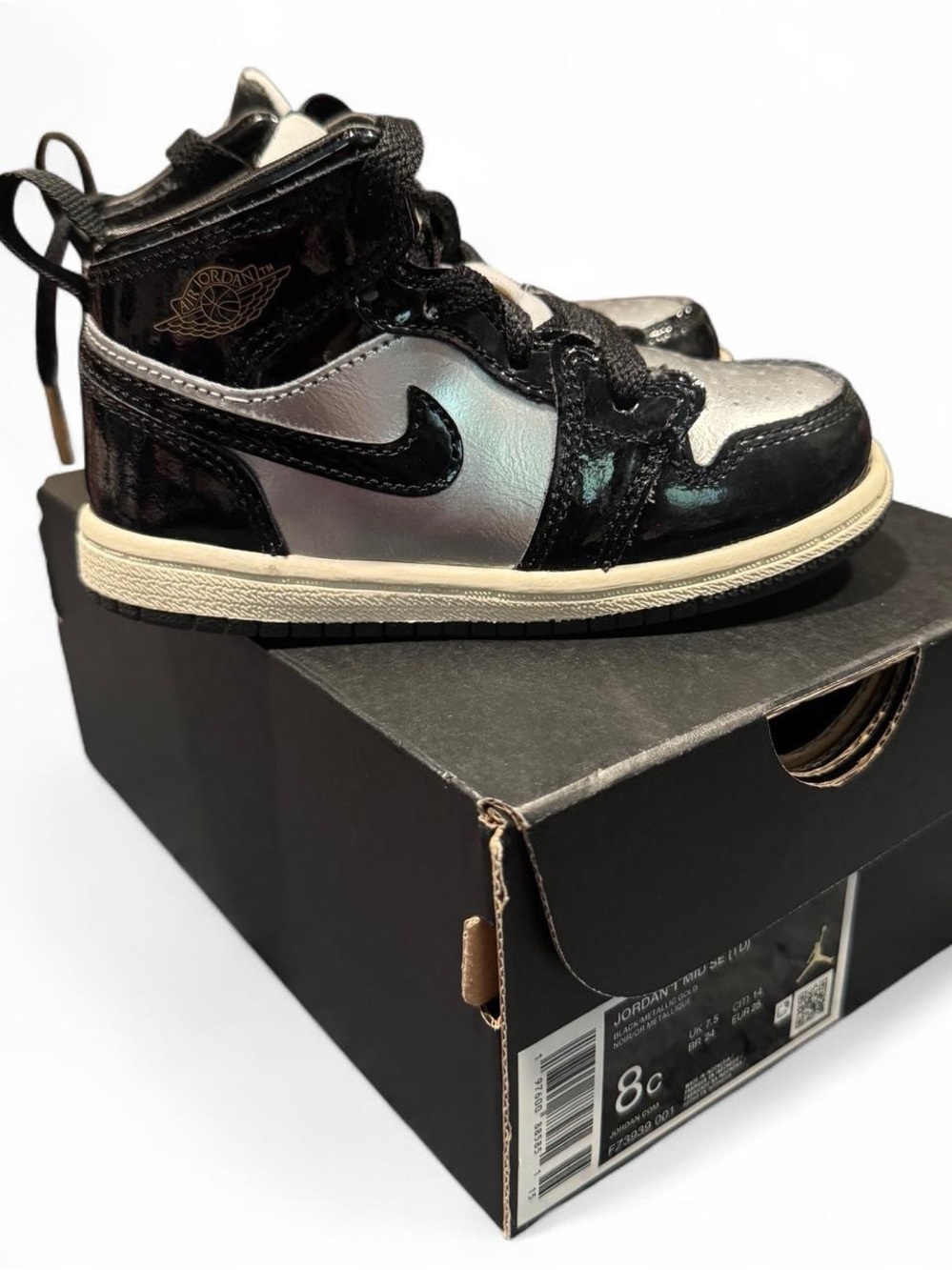 Nike Kids Black and Silver High-Top Sneakers